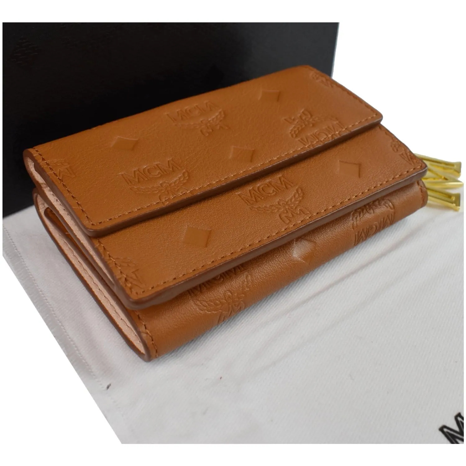 MCM Klara Trifold Mini Monogram Leather Charm Wallet Cognac