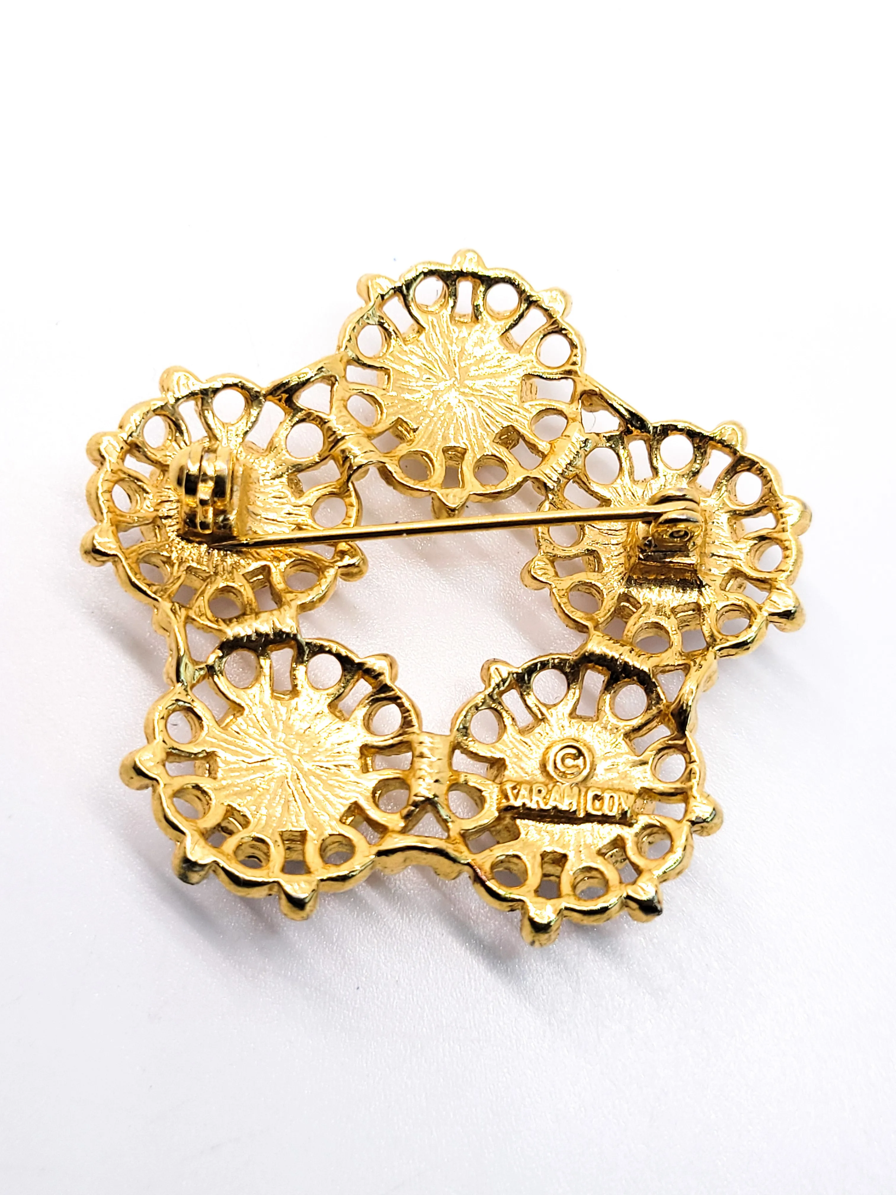 Sarah Coventry gold toned vintage domed glass flower circle brooch
