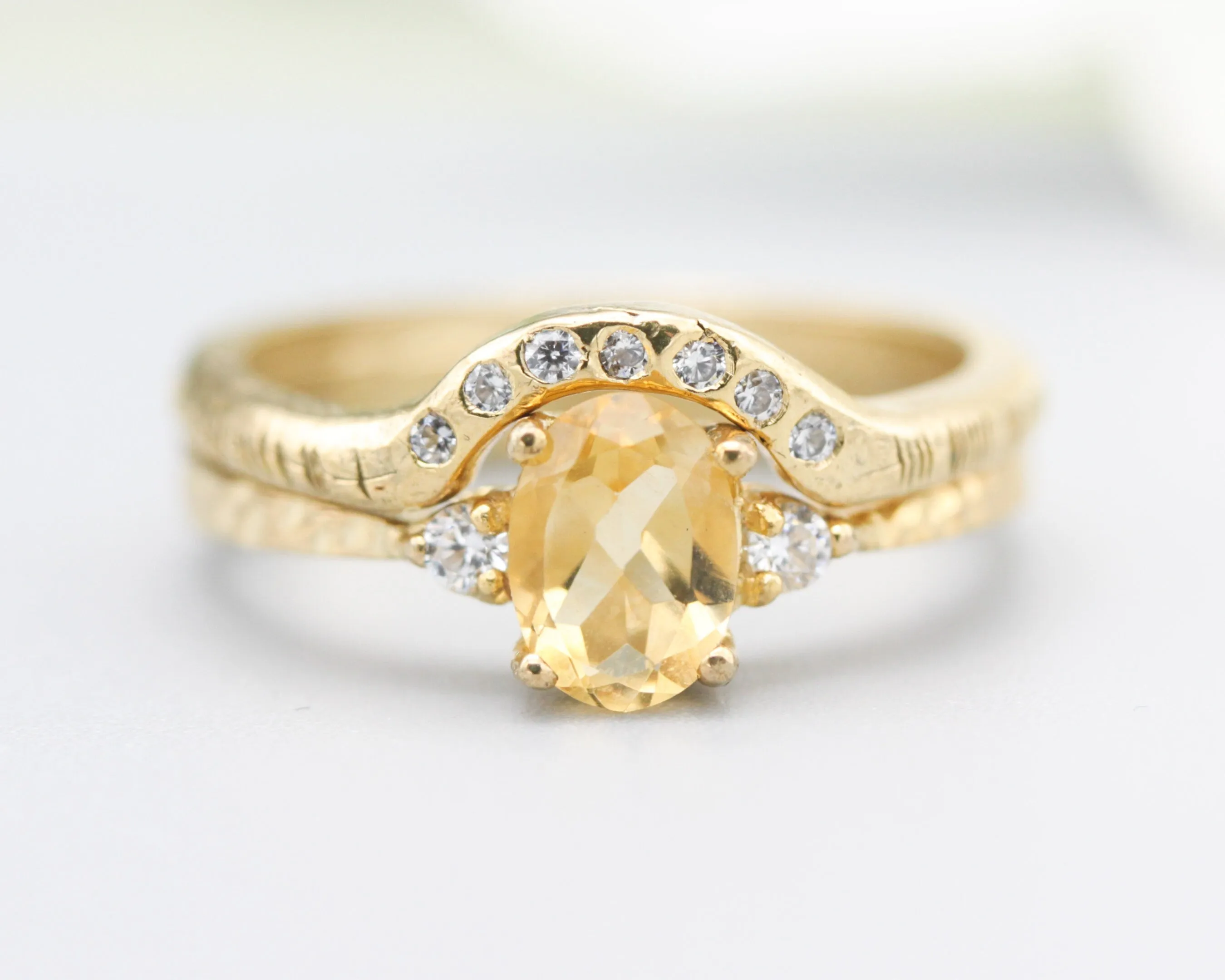 Set of 2 Oval faceted citrine ring with tiny round diamonds side set with 14k gold band ring with tiny 7 diamond on the center