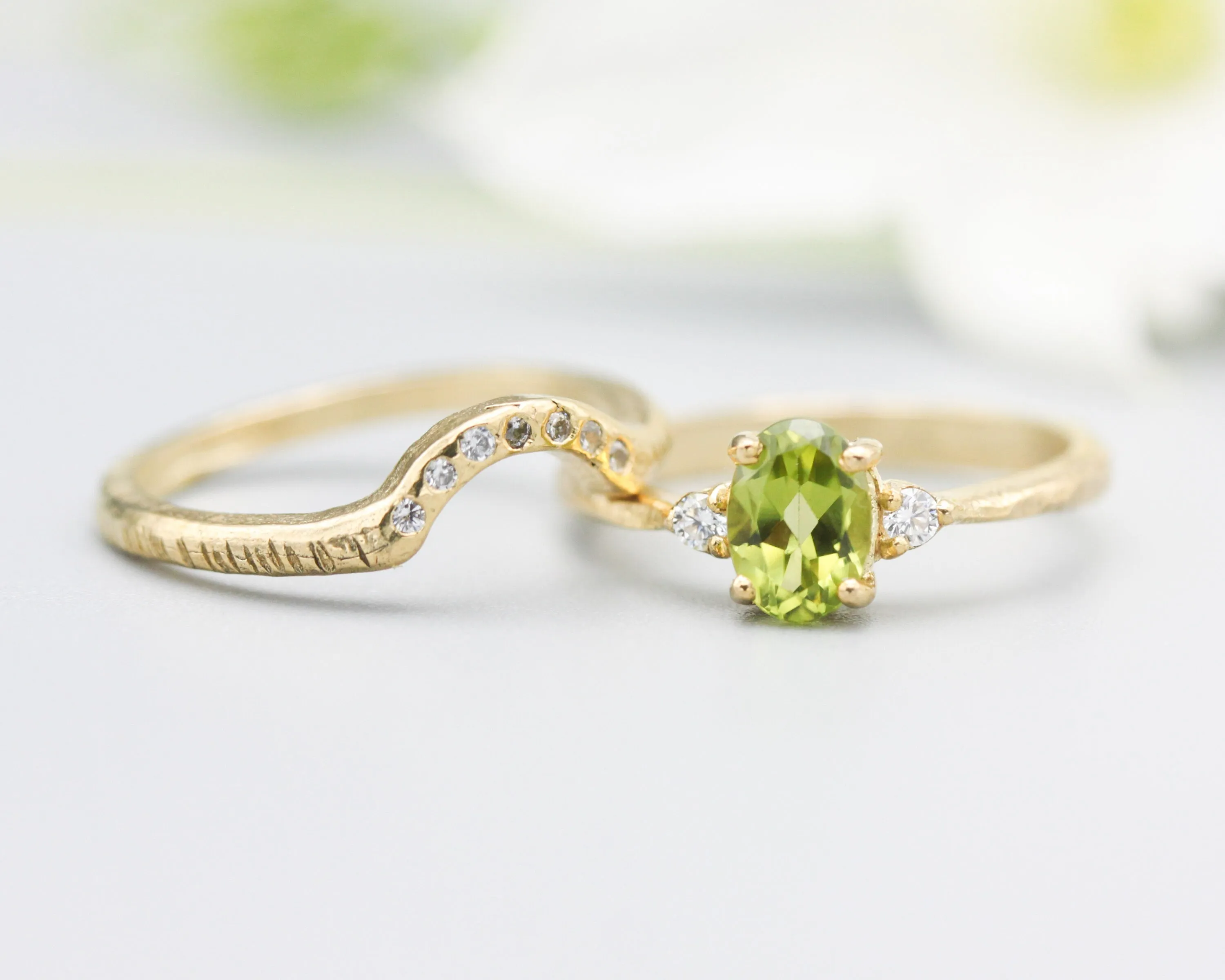 Set of 2 Oval faceted peridot ring with tiny round diamonds side set with 14k gold band ring with tiny 7 diamond on the center