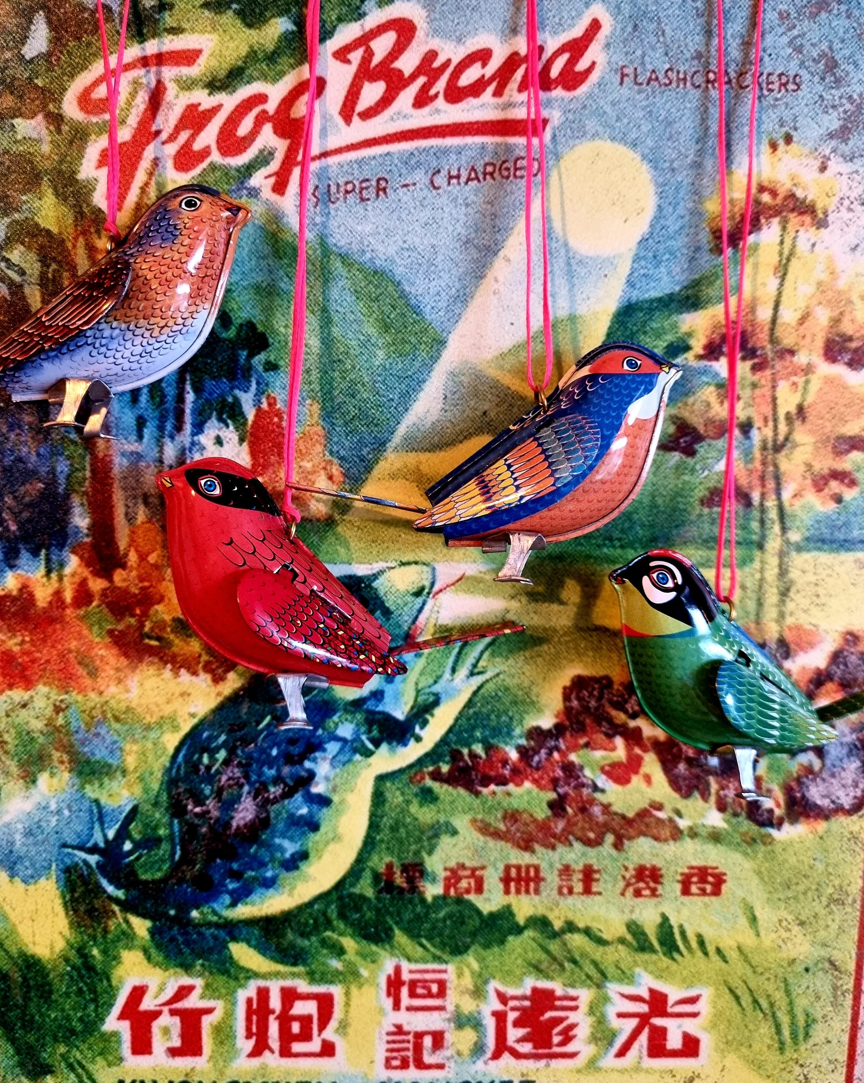 Teeny tiny tin birds.