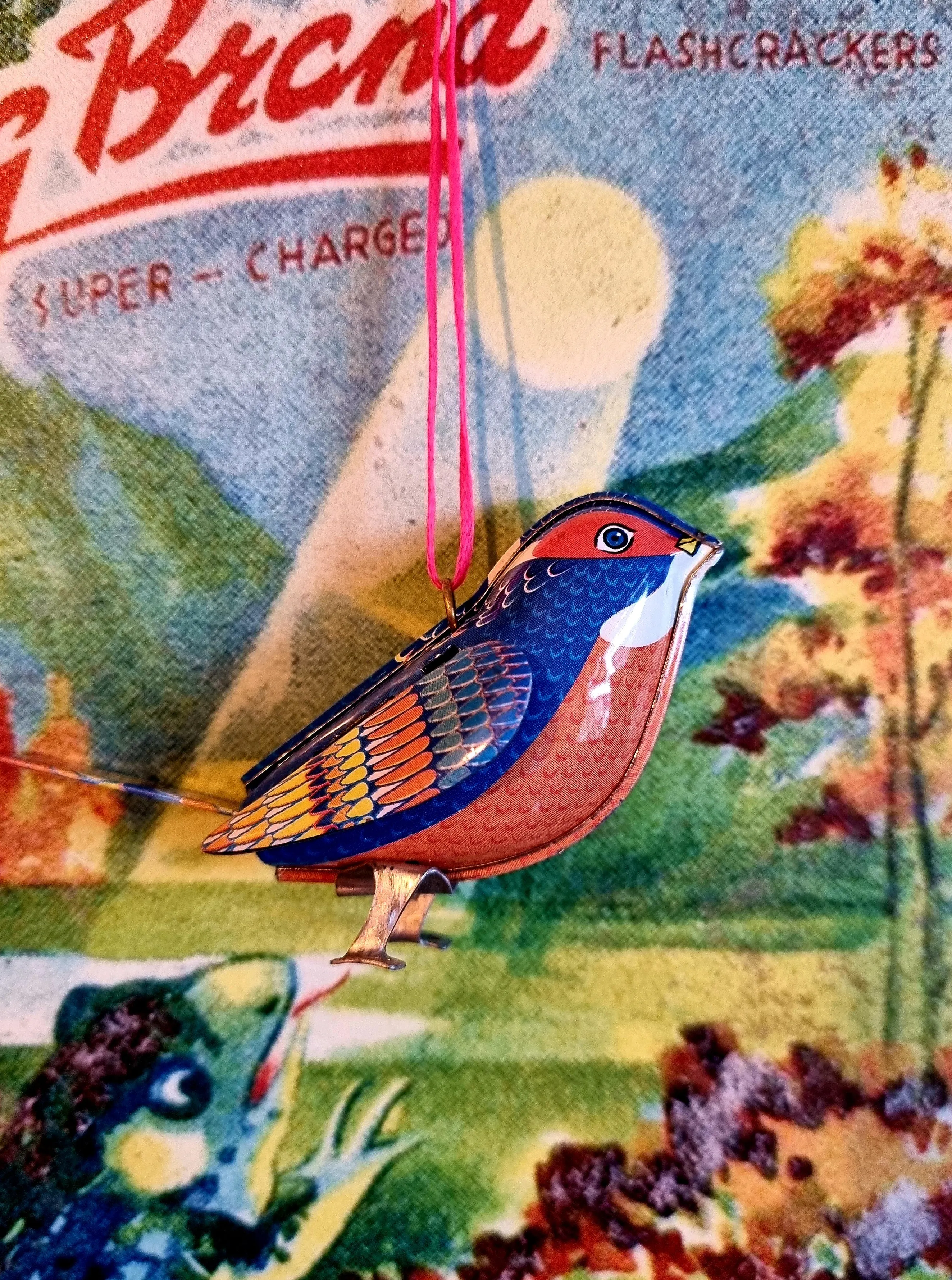 Teeny tiny tin birds.