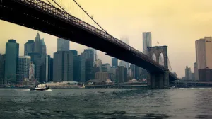 Tugboat Motors Under Brooklyn Bridge