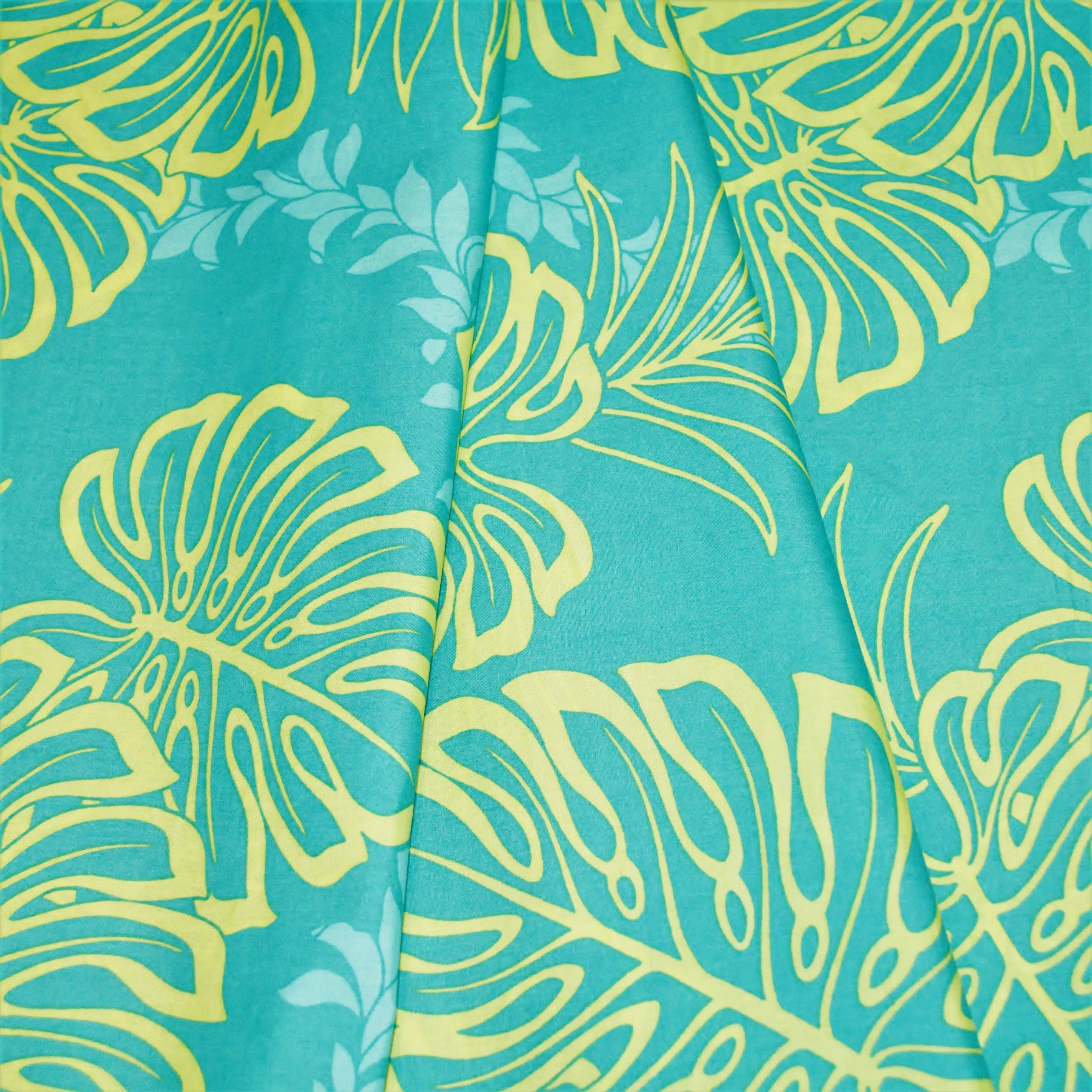 Yellow Monstera Leaf overlay on Teal